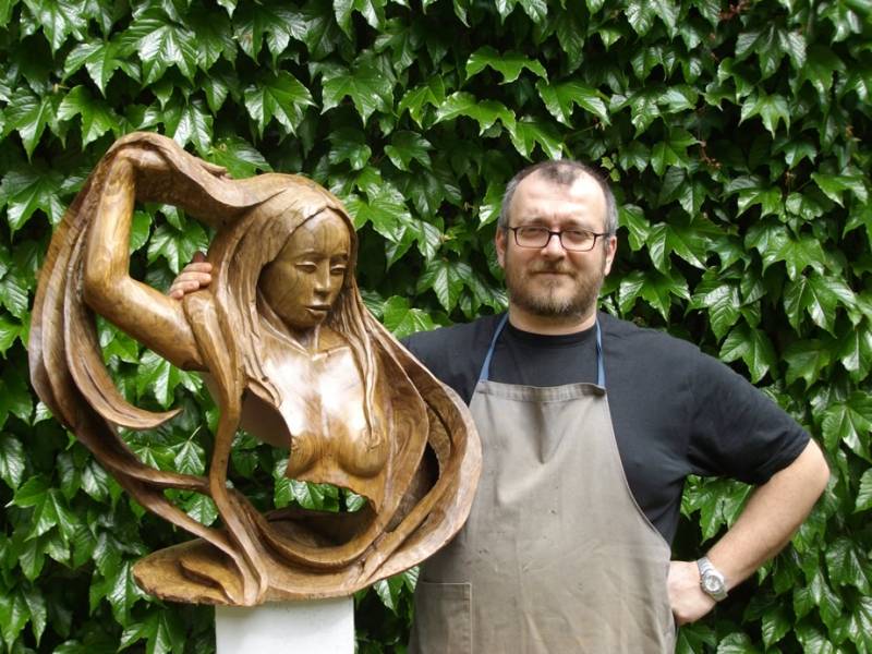 Andrea Gamba and one of his sculptures